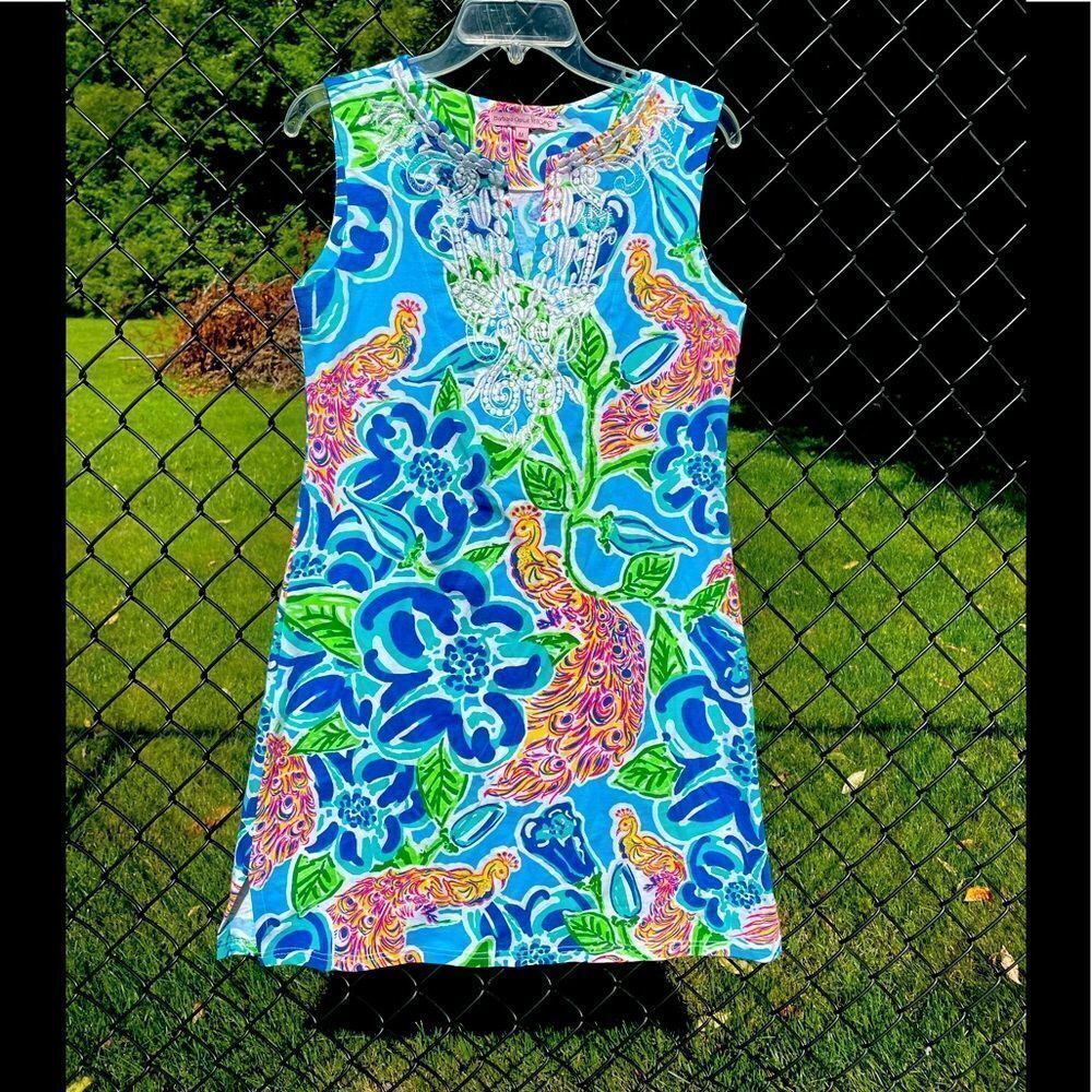 BARBARA GERWIT sleeveless tunic dress in peacock print with white embroidery